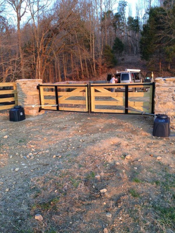 Wood driveway fence by Pro-Line Fence Co. LLC