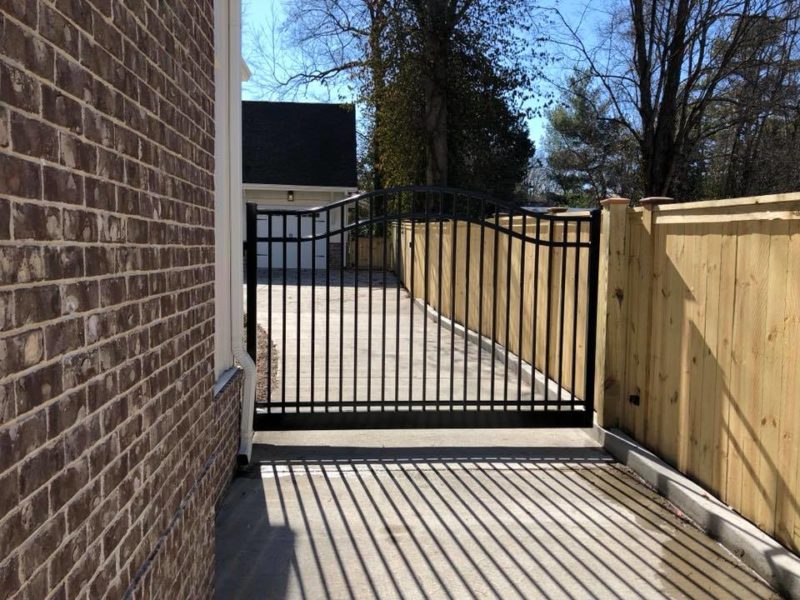 A lightweight aluminum gate installed by Pro Line Fence Co.