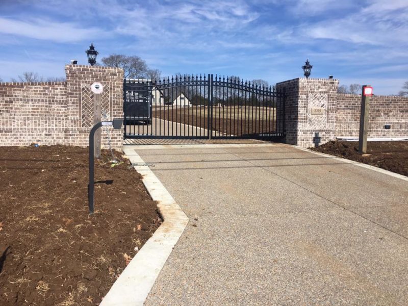 An aluminum estate gate installed by Pro Line Fence