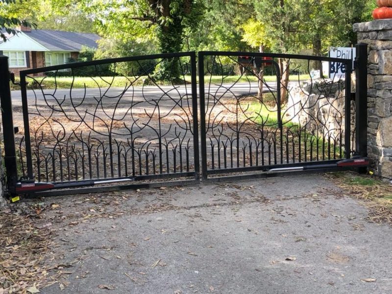 A beautiful nature-inspired ornamental fence designed and installed by Pro-Line Fence.