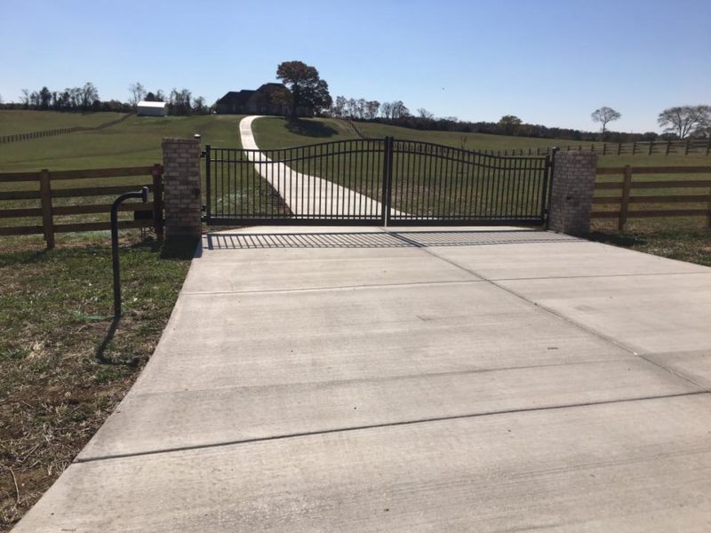 Estate driveway gate by Pro-Line Fence Co. LLC
