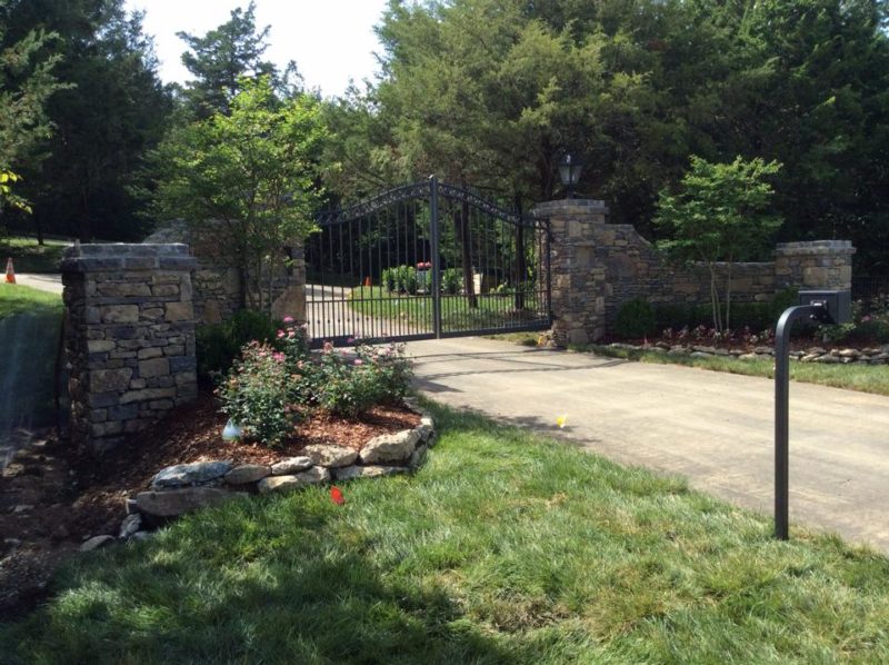 Driveway fence by Pro-Line Fence Co. LLC