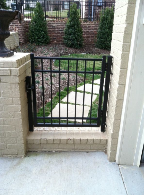 Aluminum pedestrian fence installed by Pro Line Fence Co.